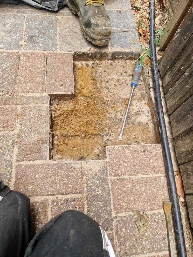 Block paving lifted and the sand bed prepared ready for reinstatement