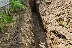 Open trench excavated for the new 63mm barrier pipe water main