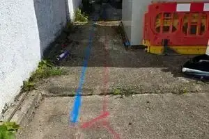 Route of the new main and service marked out on site before any excavation